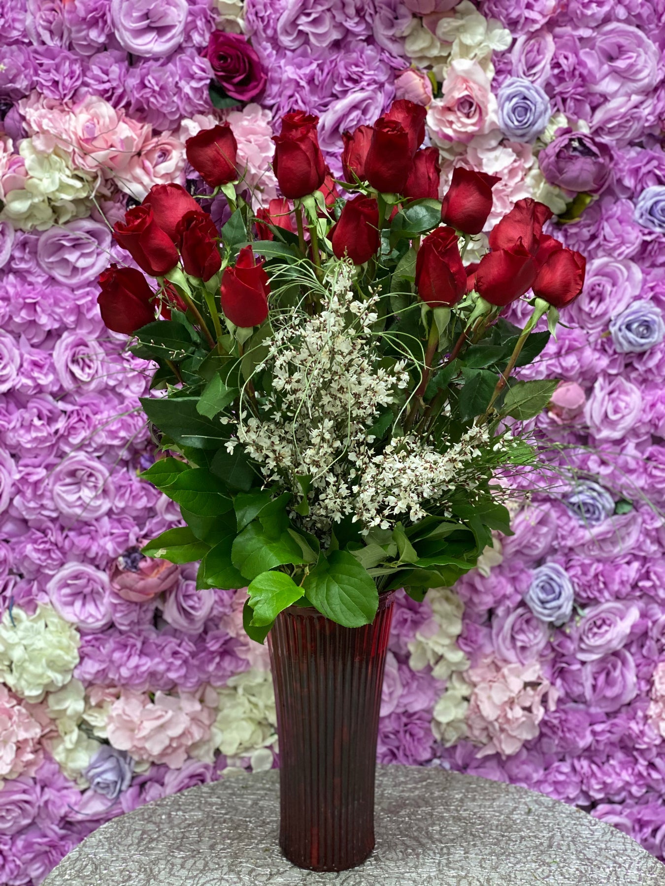 2 dozen roses in vase